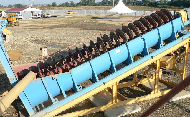 Процесс мойки песка